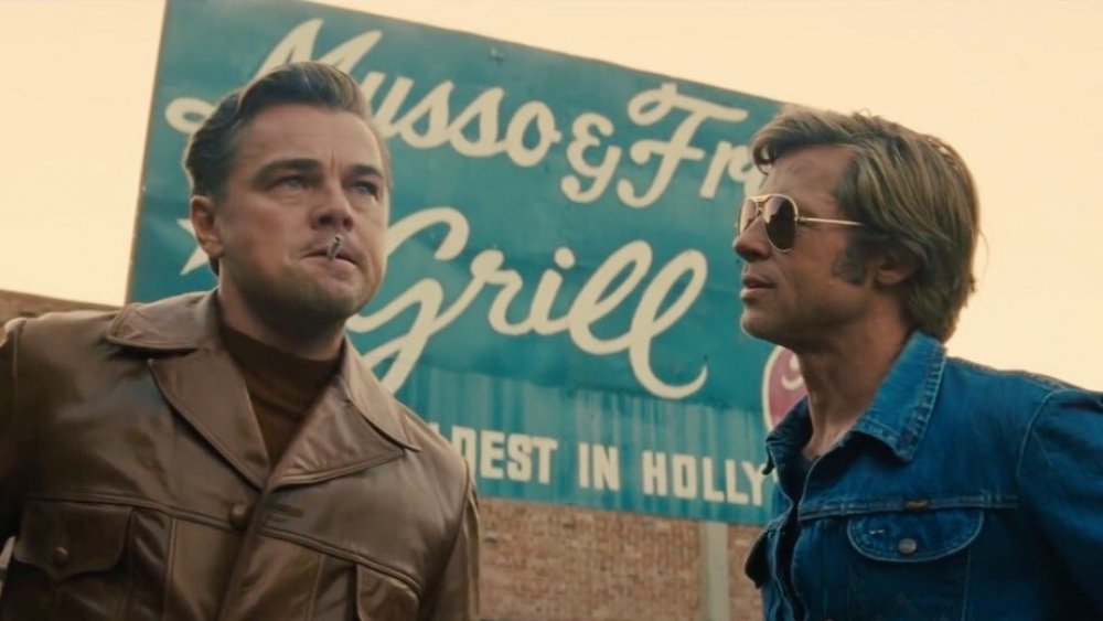 Brad Pitt looks at Leonardo DiCaprio in Once Upon a Time In Hollywood