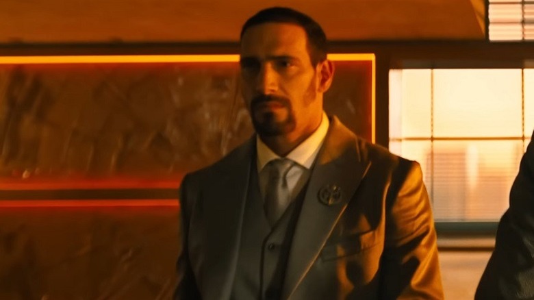 Marko Zaror wearing a suit