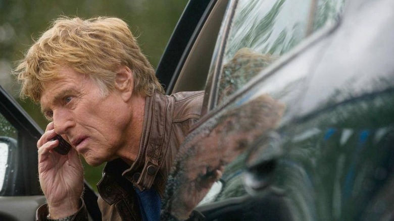 Robert Redford in a car