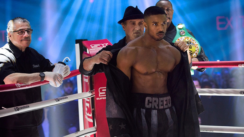 Rocky takes Creed's robe off