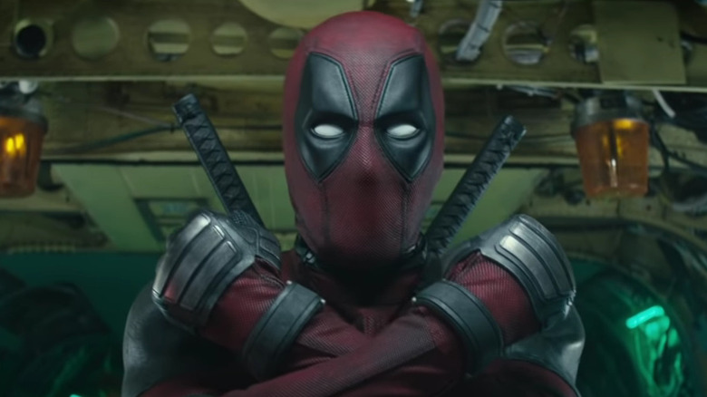 Deadpool crosses his arms over his chest