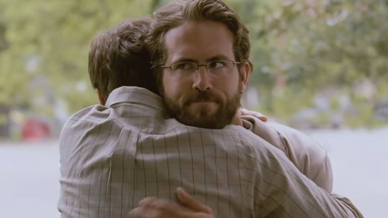 Ryan Reynolds is awkwardly hugged