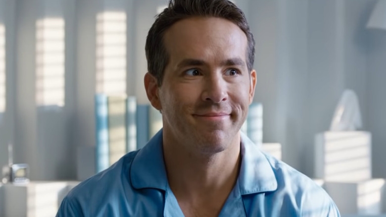 Ryan Reynolds smiles wide-eyed