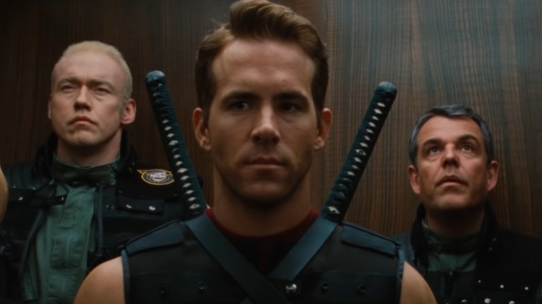 Ryan Reynolds waits in an elevator