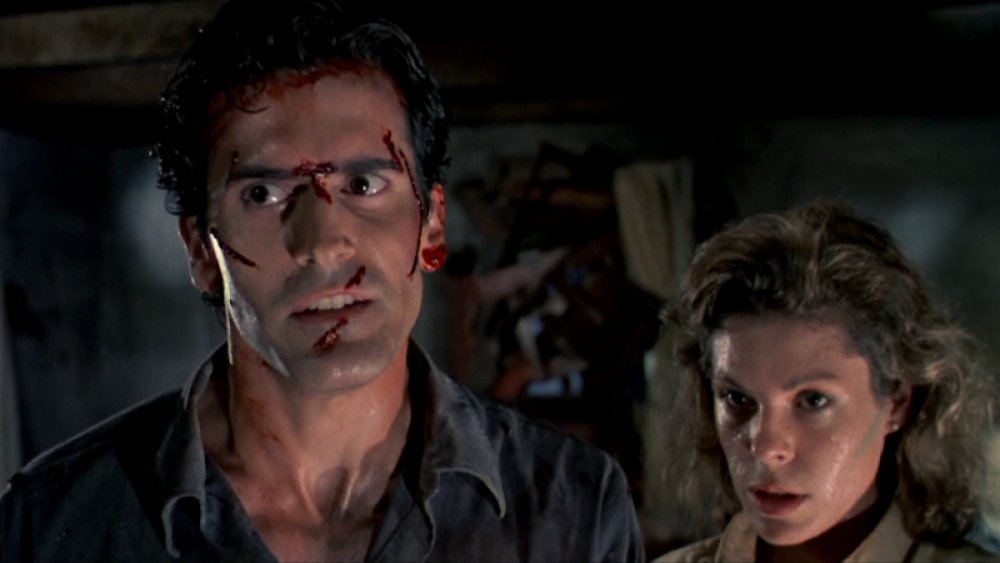 Bruce Campbell and Betsy Baker in Sam Raimi's The Evil Dead