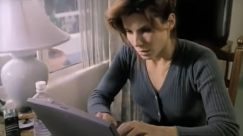 Angela Bennett on the computer