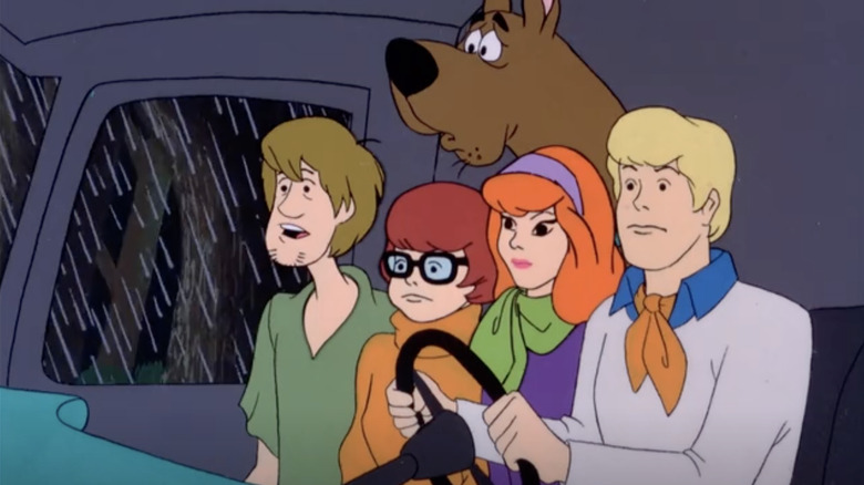 Mystery Inc. in the rain