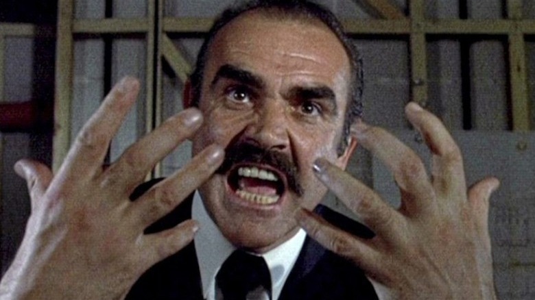 Sean Connery holds up his hands in rage