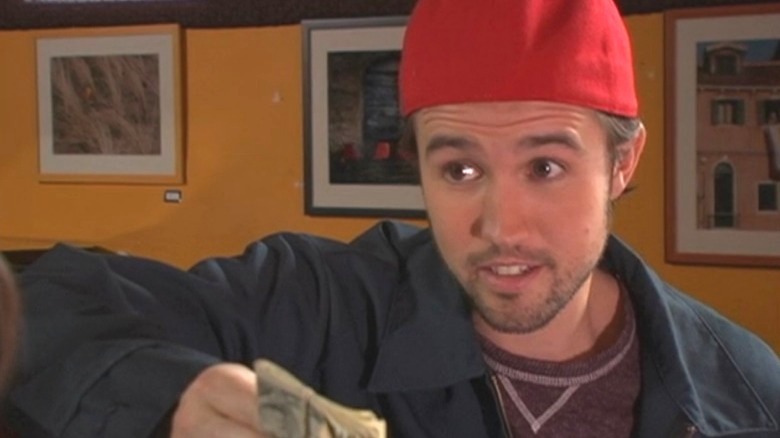 Mac holding money