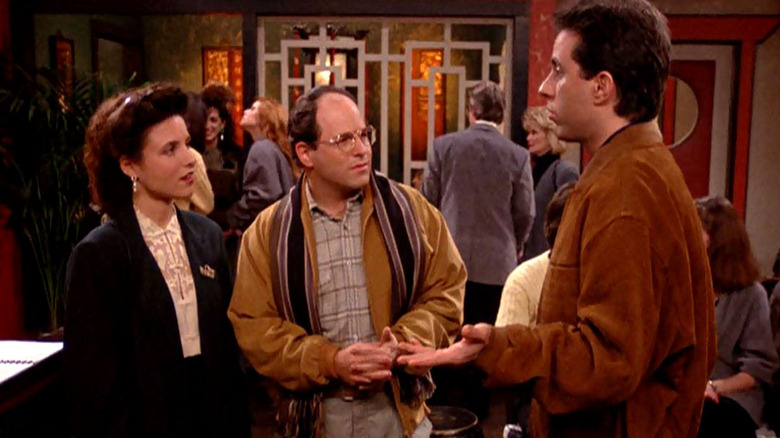 Elaine and George looking at Jerry