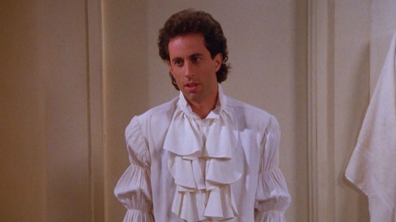 Jerry dejected in the puffy shirt