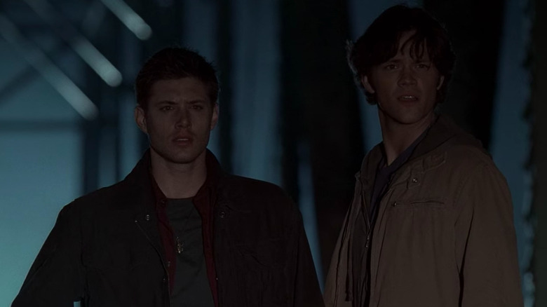 Sam and Dean looking concerned in Supernatural's pilot