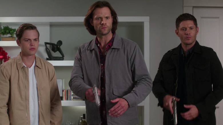 A worried Sam and Dean stand by Jack