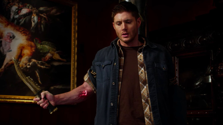 Dean with the Mark of Cain emblazoned on his arm