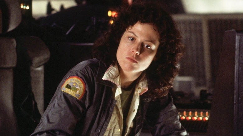 Ripley sitting pensively