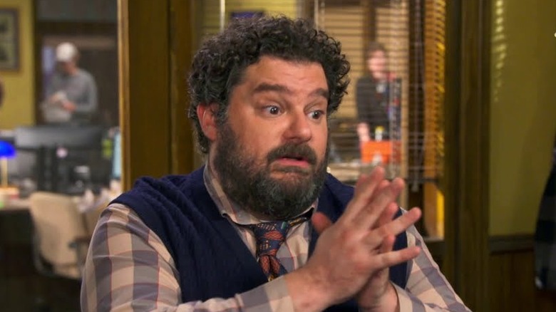 Bobby Moynihan talking indoors