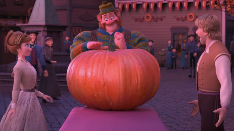 Anna, Kristoff, and Wandering Oaken with a huge pumpkin