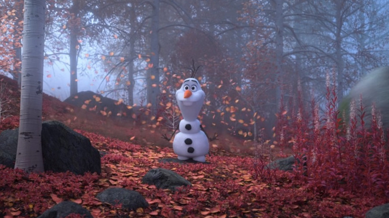 Olaf frolicking in red leaves