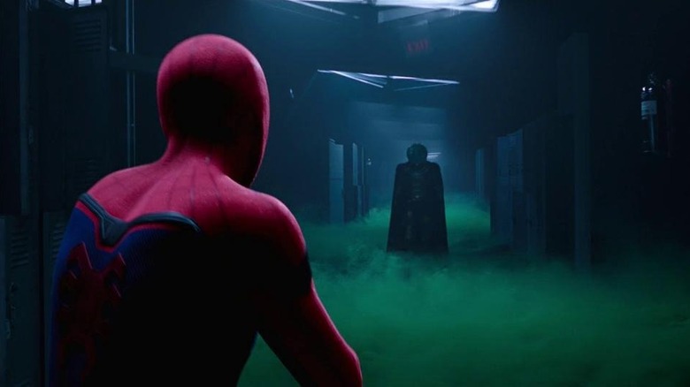 Spider-Man confronting Mysterio in hallway