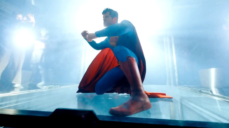 Superman getting ready to smash some glass in Superman (2025)