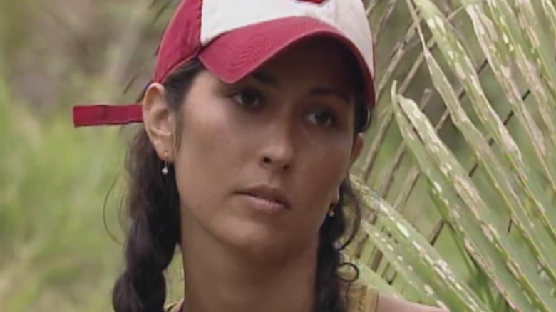 Survivor contestant wearing hat