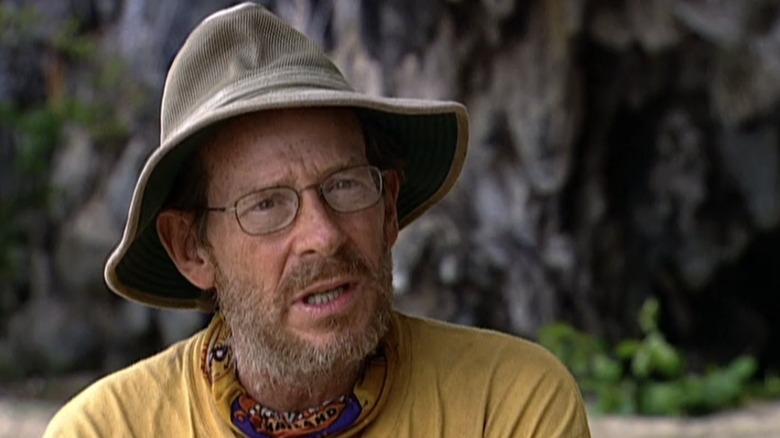 Survivor contestant wearing hat