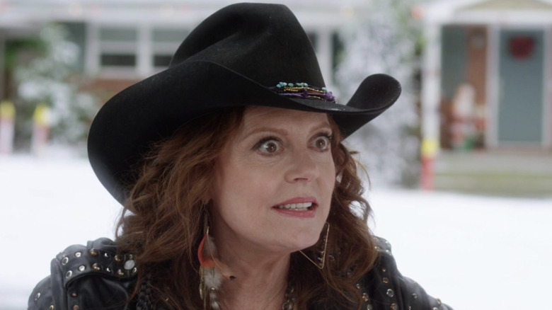 Susan Sarandon wide eyed in cowboy hat