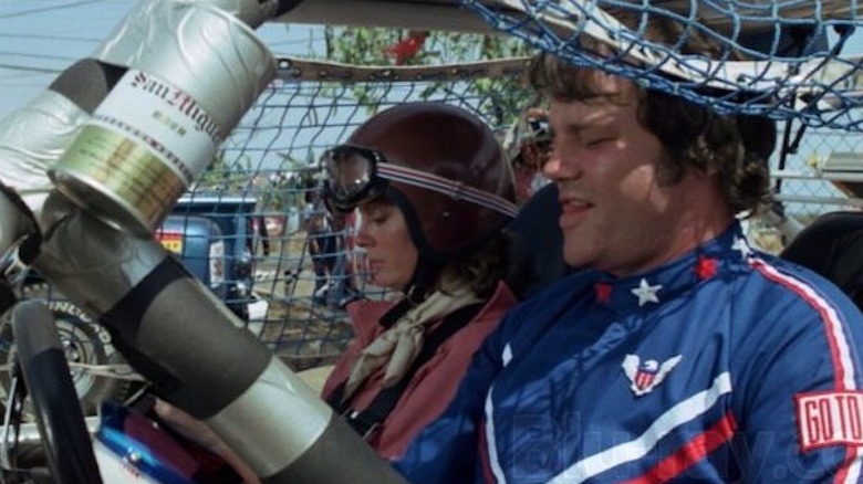 Walkaway and CC in a race car in "Checkered Flag or Crash" (1977)