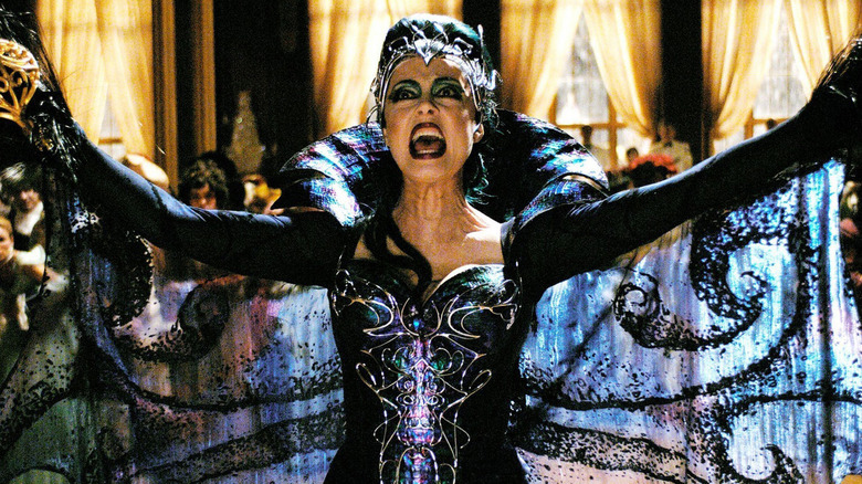 Screaming Queen Narissa raises her arms in "Enchanted" (2007)