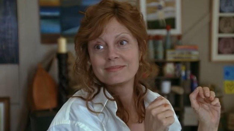 Surprised Sarandon holds up her hands