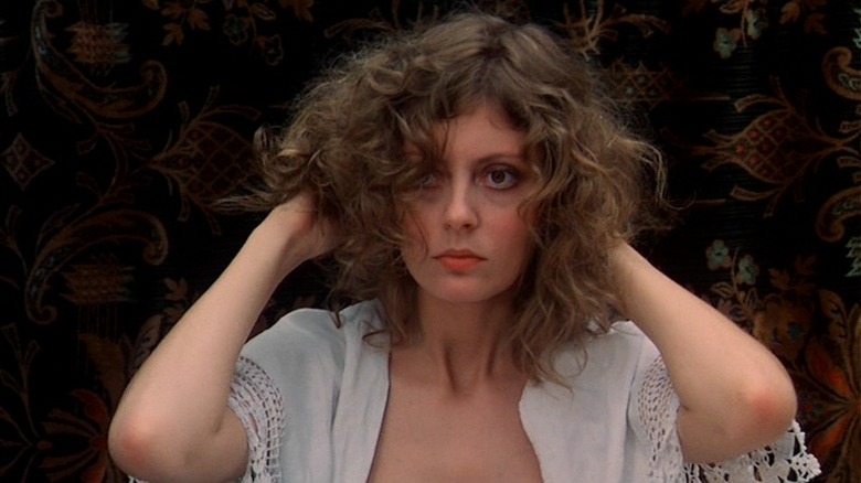 Susan Sarandon runs her hands through her hair