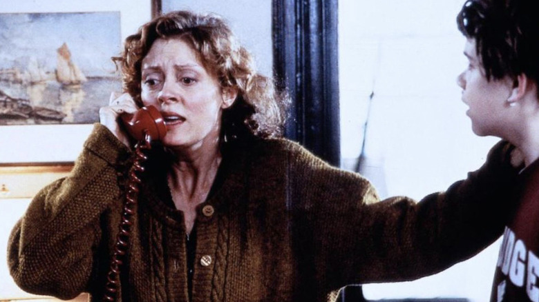 Upset Susan Sarandon holds up phone