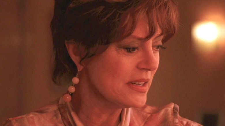 Susan Sarandon looks down to the right