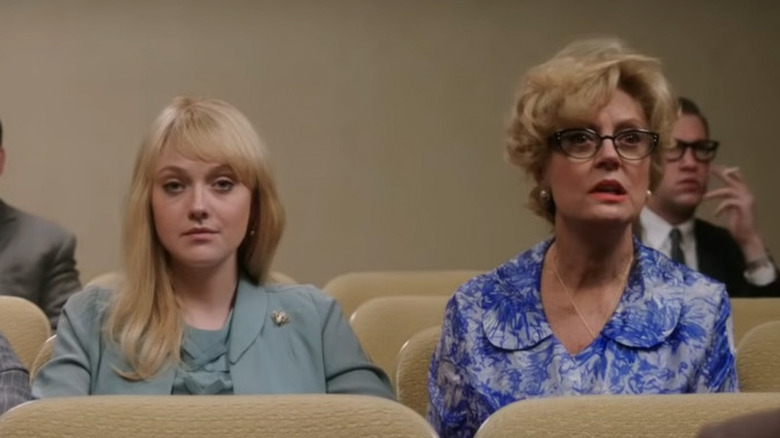 Beverly and Florence sit in rows of seats