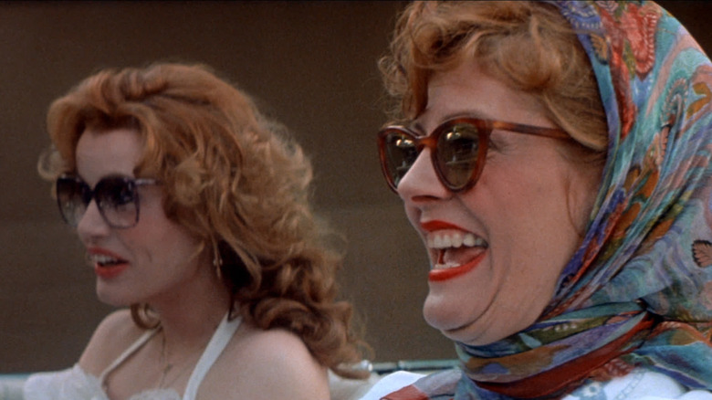 Thelma and Louise laugh in car