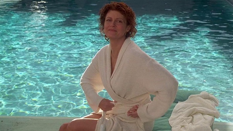 Susan Sarandon in a robe by a pool