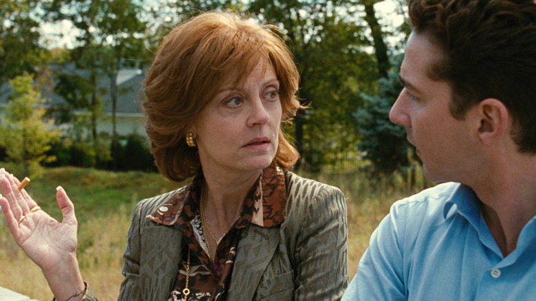 Sarandon holds cigarette and looks at Shia LeBeouf