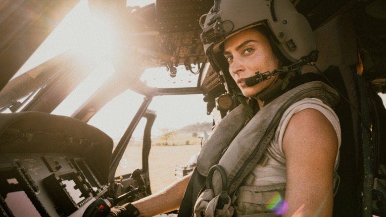 Sergeant First Class Cruz Manuelos sitting in a helicopter in "Lioness"