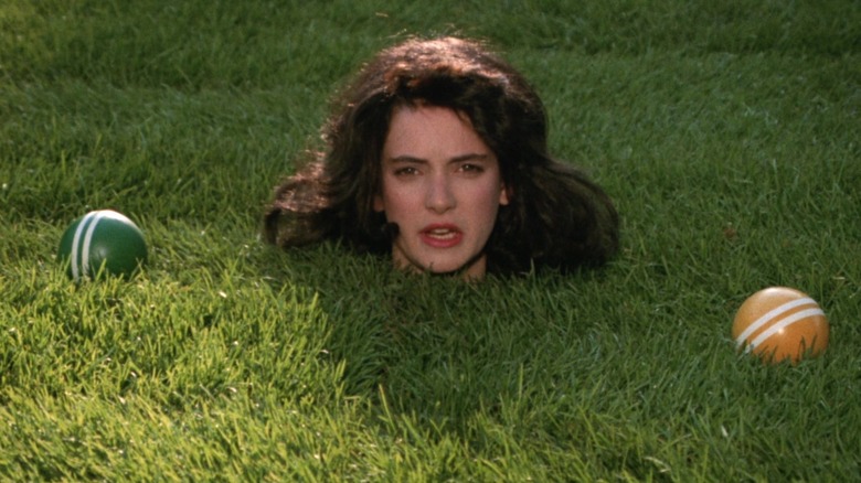 Winona Ryder's head in the grass in Heathers