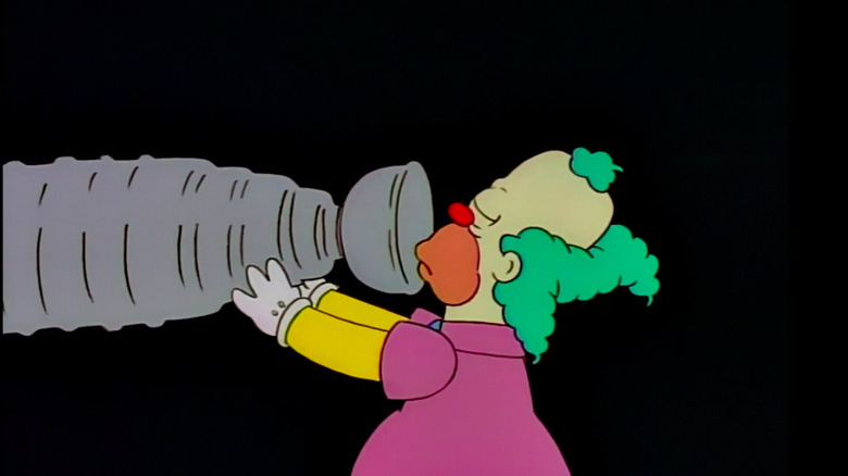 Krusty drinking from the Stanley Cup