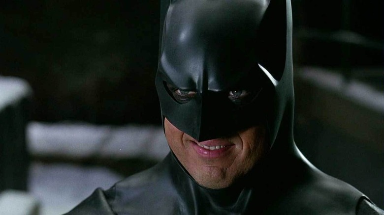 Michael Keaton as Batman smiles