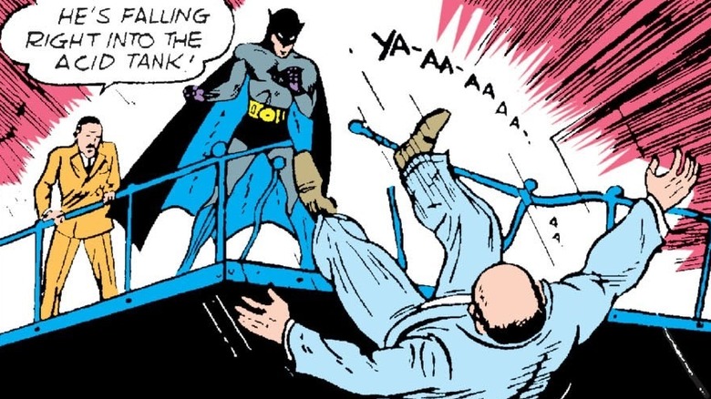 Batman knocks a man into acid 