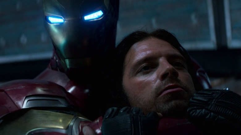 Iron Man strangling Bucky Barnes