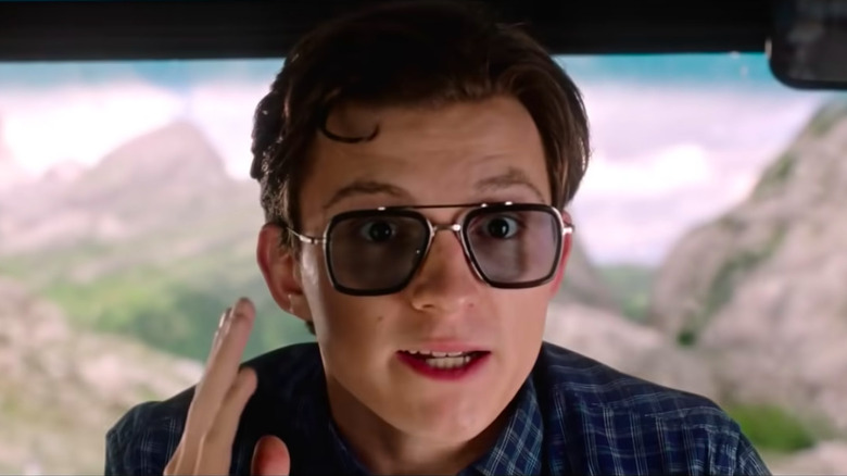 Peter Parker wearing the glasses containing E.D.I.T.H.