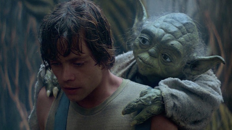 Luke with Yoda on his back