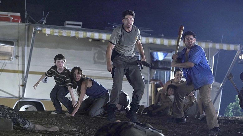 Shane and others defending camp The Walking Dead
