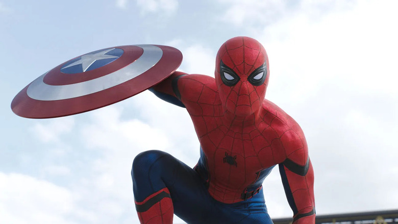 Spider-Man holds Captain America's shield