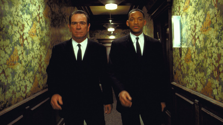 Agents K and J walk down a hall in "Men in Black II" (2002)