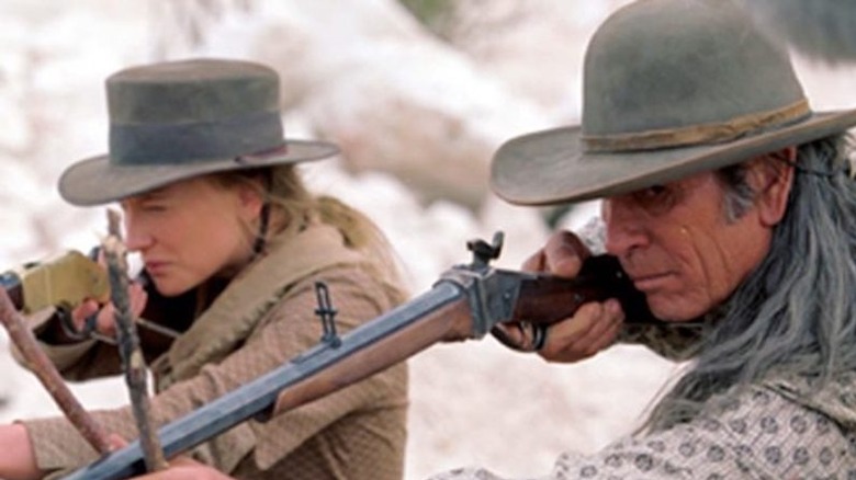 Maggie and Samuel take aim in "The Missing" (2003)