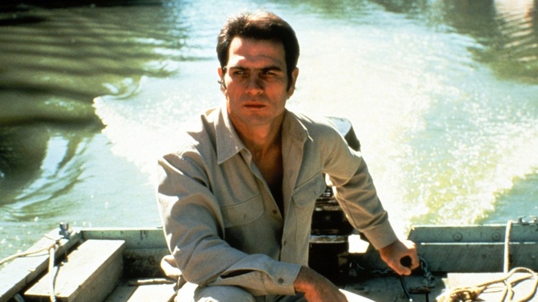 Billy drives a boat in "The River Rat" (1984)